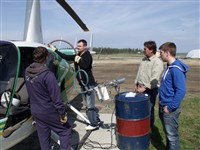Kal fuelling up. Lots of supervision. May 2011